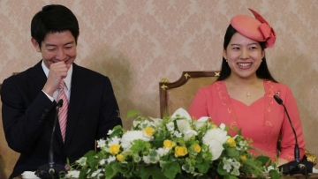 Japanese Princess Ayako and her fiance Kei Moriya attend a news conference to announce their engagement in Tokyo
