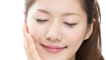 Beautiful asian woman on white background