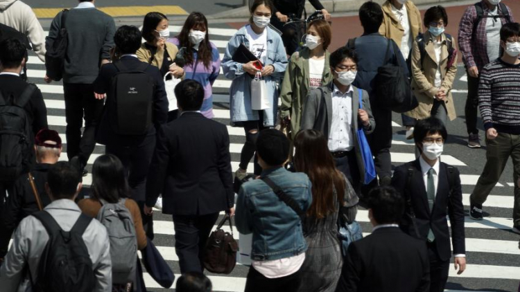 Orang di Tokyo (APEugene Hoshiko via japantoday.com) Orang di Tokyo (APEugene Hoshiko via japantoday.com)