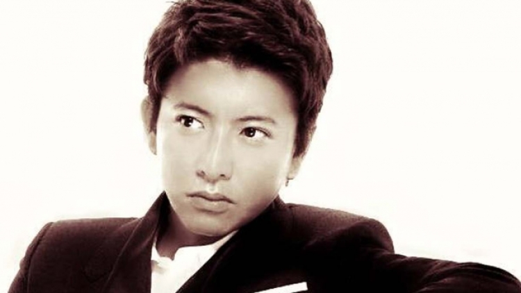 Takuya Kimura tiba untuk kunjungan pertamanya di Taiwan